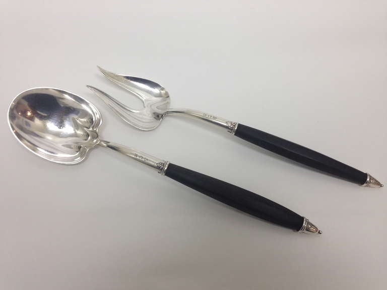 This set was executed in the 1920s by Tiffany & Co New York the ebony handles and the beautiful shapes and hand wrought artisanship involved in
the sterling elements in the combination are appealing. These are literally art
for use at your dinner