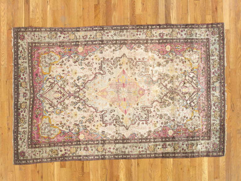 The best of Kashan’s from the late 19th and early 20th centuries are referred to as Motasham Kashan’s. They are some of the most finely woven of all Persian rugs, characterized by a beautiful sheen. This is a very rare silk example.
Please contact
