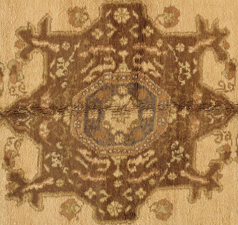 West Anatolia is one of the largest weaving regions in Turkey. Since the 15th century, Turkish rugs have always been on top of the list for having fine Oriental rugs. 
Oushak rugs such as this, are desirable in today’s highly decorative market. A