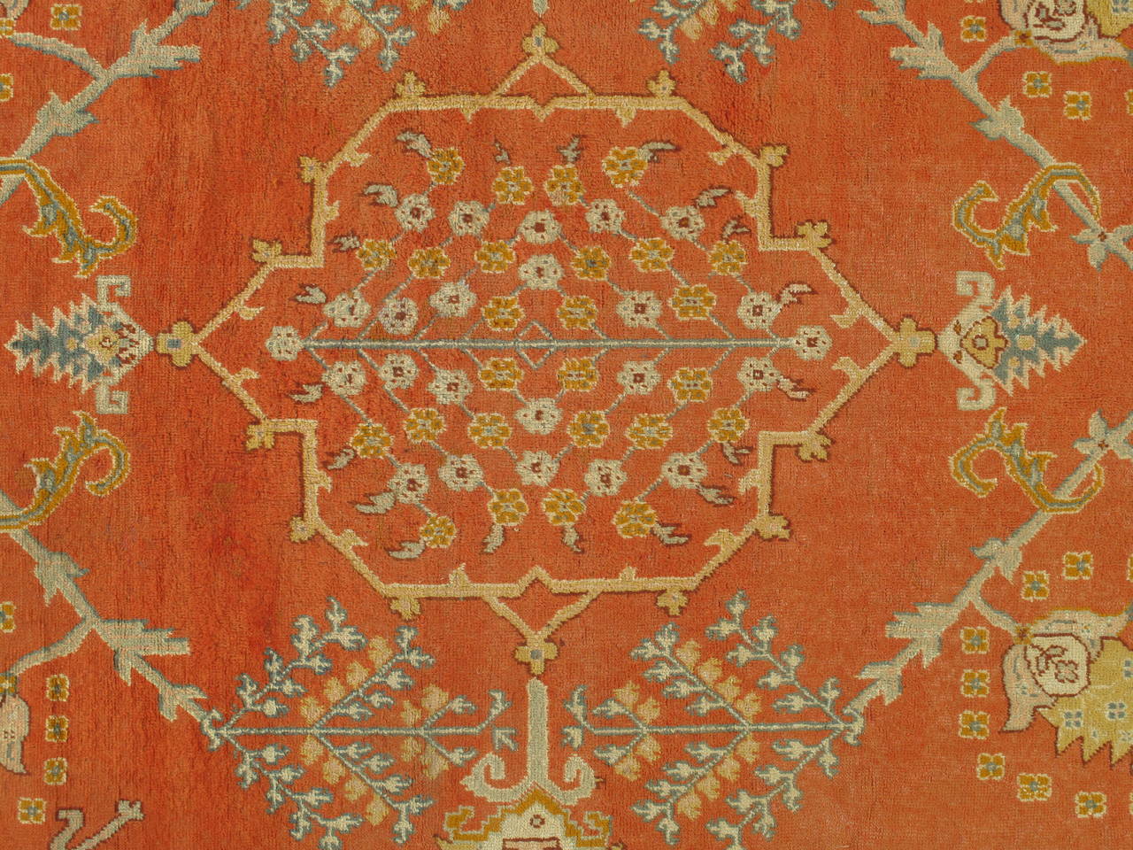 Turkish carpet from Oushak with a combination of soft colors on a center medallion design. Finely woven, having the most superb wool found in the mountains of Anatolia.
Measures: 16'2