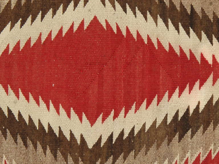 Navajo rugs and blankets are textiles produced by Navajo people of the Four Corners area of the United States. Navajo textiles are highly regarded and have been sought after as trade items for over 150 years. Commercial production of handwoven