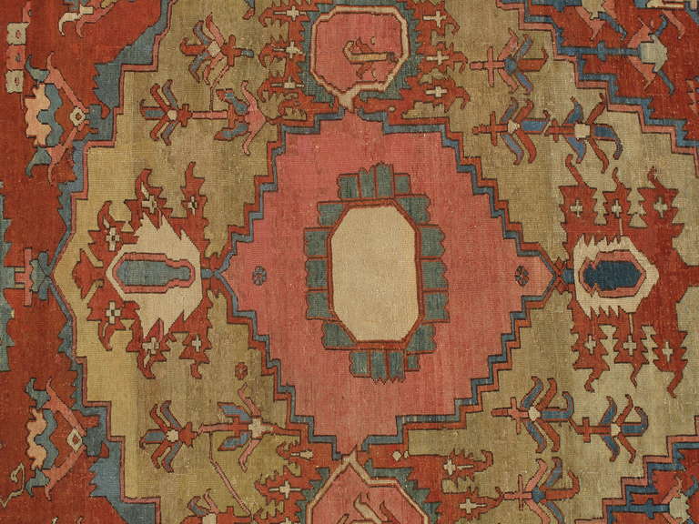 Antique Serapi carpets are one of the most sought after rugs particularly in America and England for many years. Antique Serapi rugs are a major draw particularly in big city America. Serapi carpets were woven on the level of small workshop with