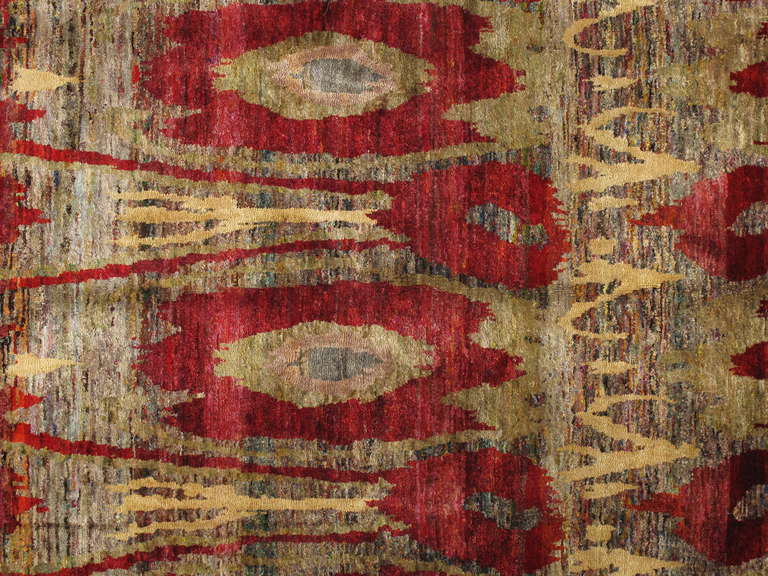 Unique and unusual this Sari silk rug is hand knotted from recycled silk. No two rugs are exactly alike as the colors of the silk used are constantly changing naturally.  The secret to these rugs is the recycled sari silk that goes into them.