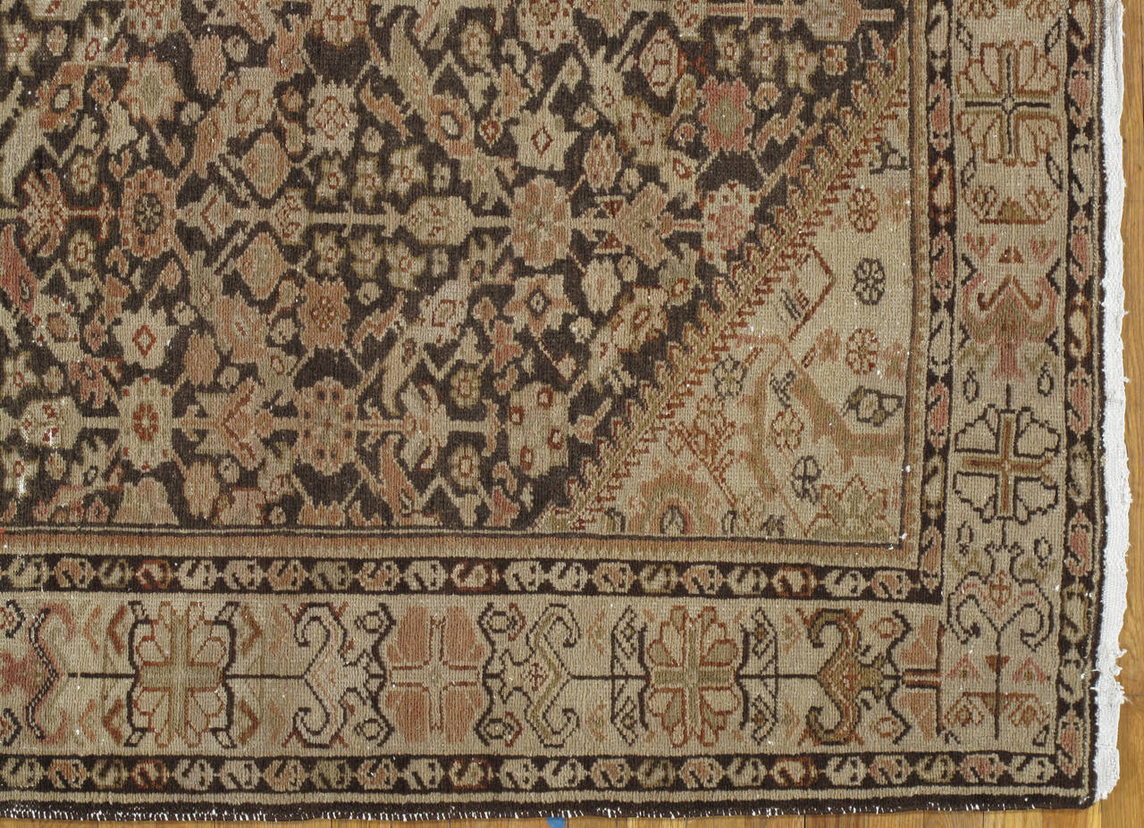 Malayer is a large village located between the major weaving areas of Hamadan and Sarouk in northwest Persia. In Malayer and the small villages surrounding it, production was almost exclusively small rugs and runners made by individual weavers in