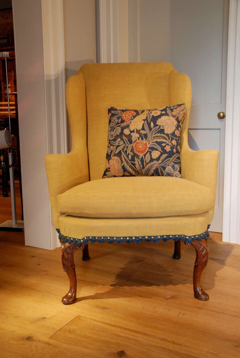 Upholstery A Fine George I Carved Walnut Wing Chair. Circa 1725