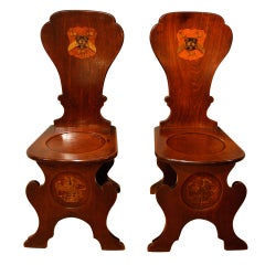 A pair of mahogany hall chairs. Circa 1740.