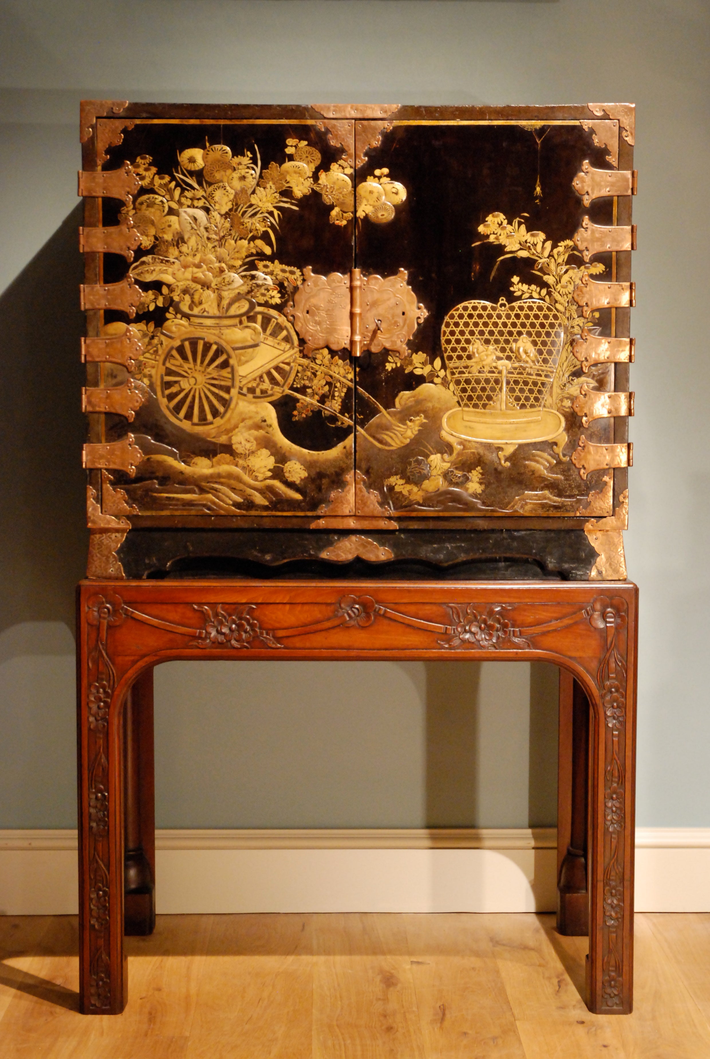 A late 17th Century lacquer cabinet on stand.