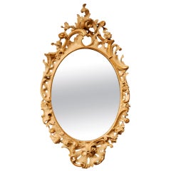 An 18th Century Rococo mirror.