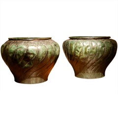 17th Century copper urns.