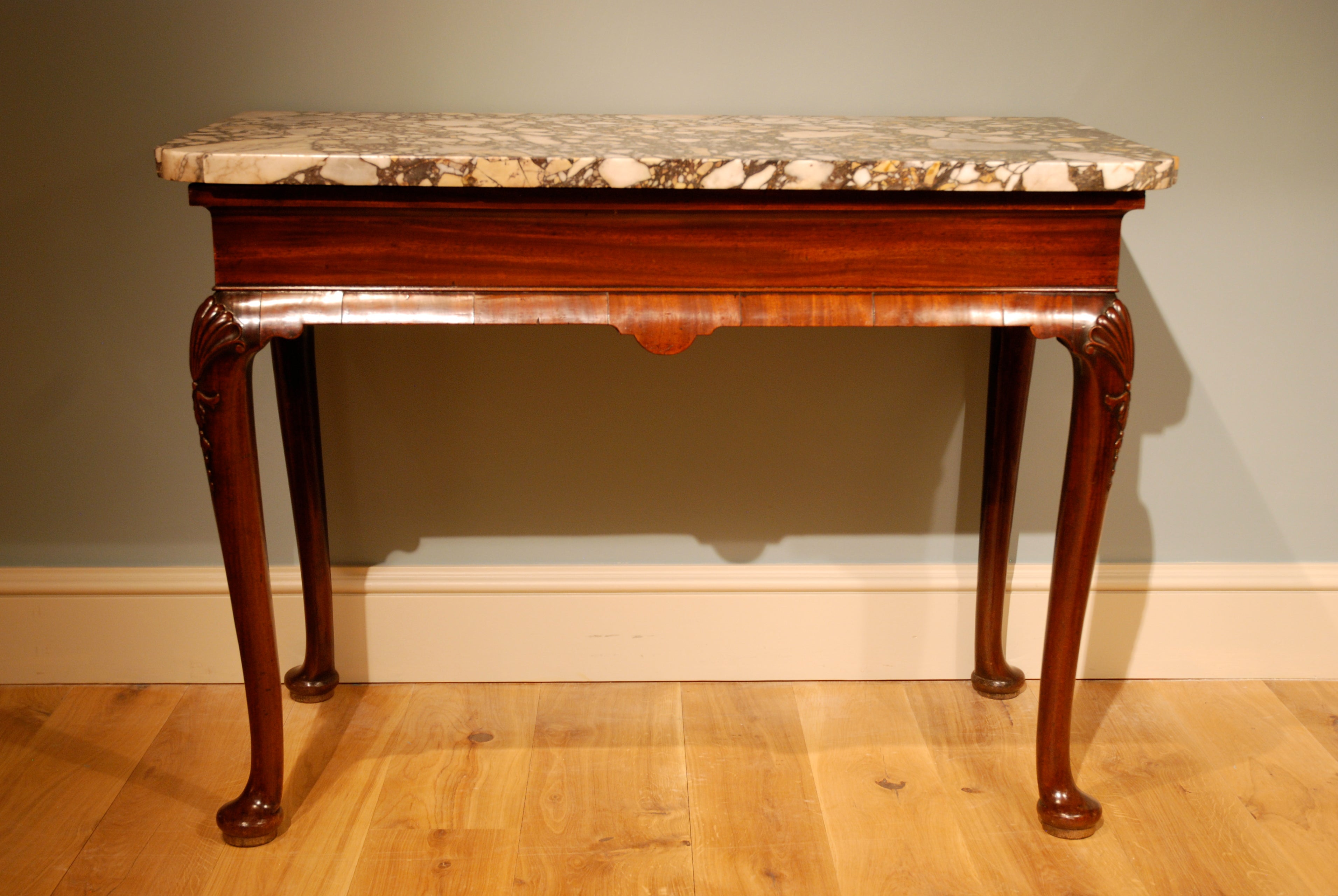 An 18th Century Marble Top Side Table.