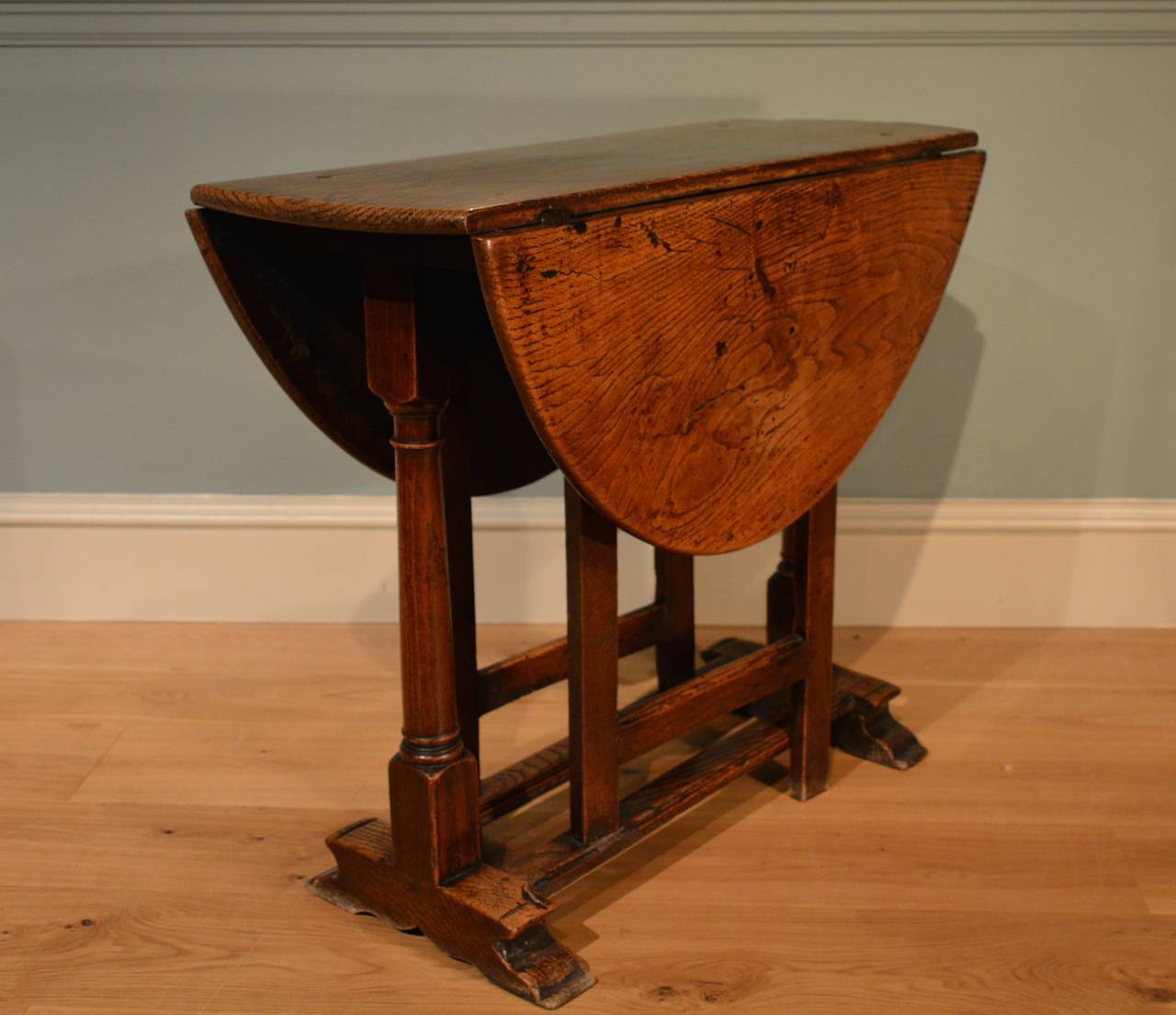 A small late 17th century oak gate-leg table of restrained design, with exceptional color and patination, circa 1680.