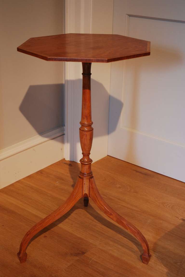 An 18th Century elegant satinwood tripod table with a finely crossbanded octagonal top. Circa 1790.