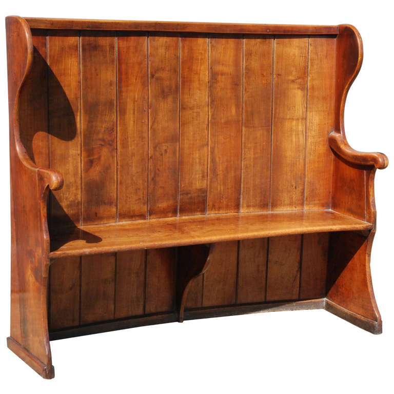 A late 18th century fruitwood settle. For Sale