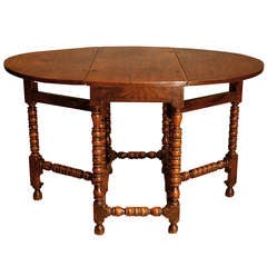 A Late 17th Century Elm Gateleg Table.