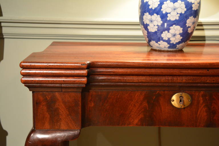 A George II mahogany triple-top cabriole-leg games table having tea, card and chess or backgammon surfaces. This piece has particularly well chosen timber and retains it's very good patination and colour. Circa 1740