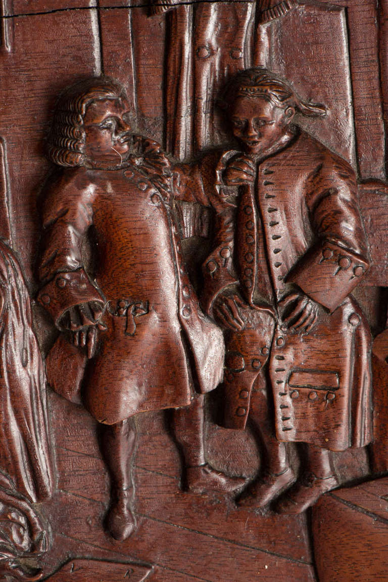 Very well carved panel of a Hogarth with integral frame