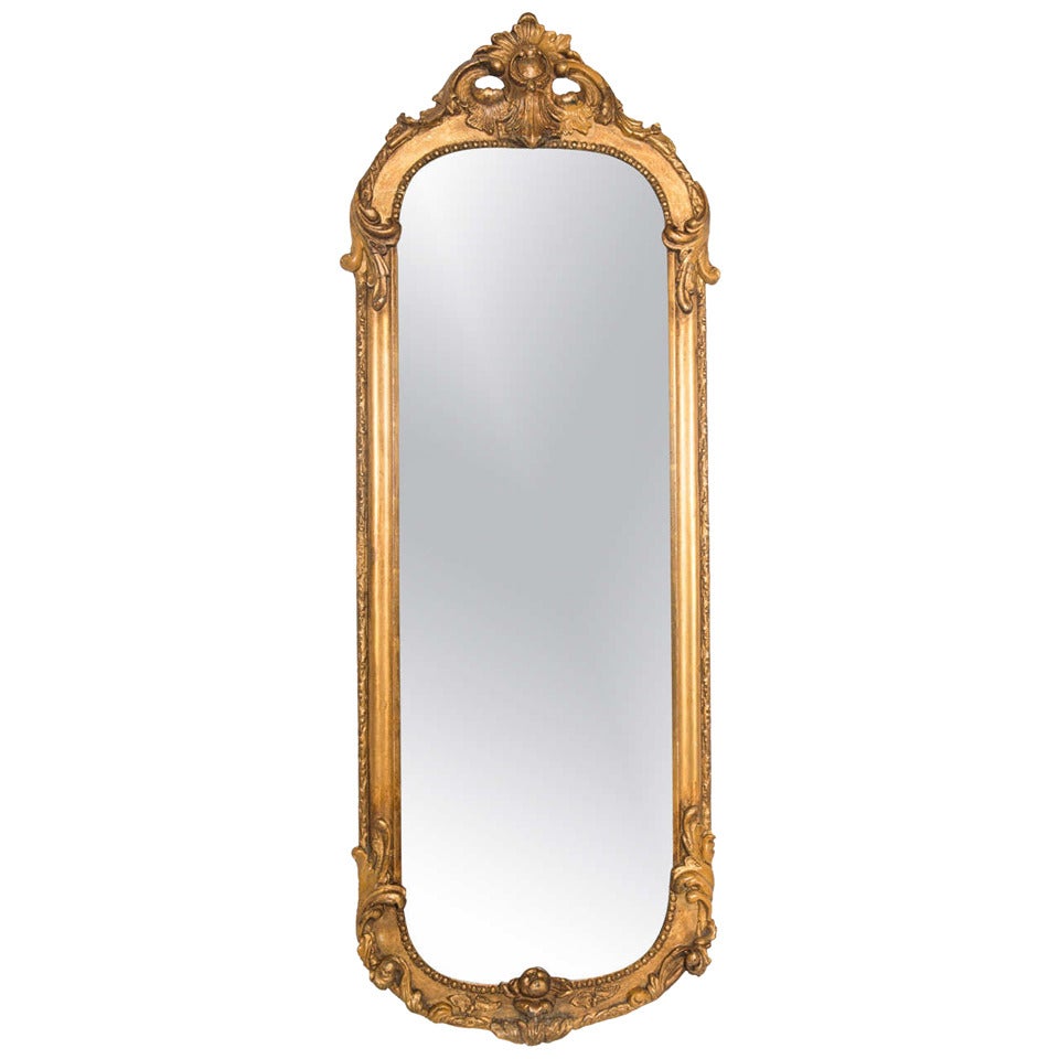 Gilt cared wood frame mirror For Sale at 1stDibs