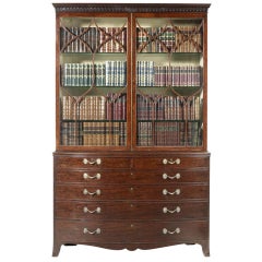 Regency period bowfronted fiddleback mahogany bookcase of large size