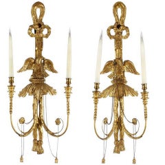 A pair of Regency style giltwood wall lights