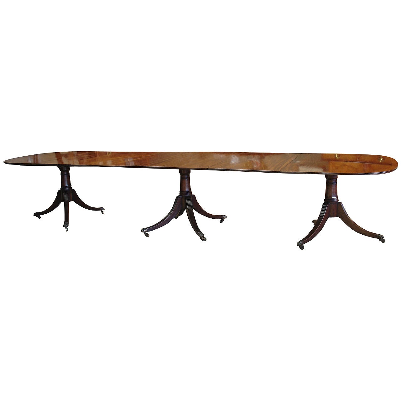 Late George III or Regency Period Mahogany Triple Pedestal Dining Table