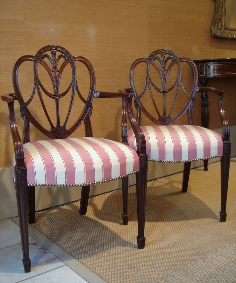 Pair of George III 'Feather and Drapery' Armchairs