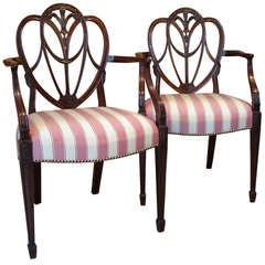 Pair of George III 'Feather and Drapery' Armchairs