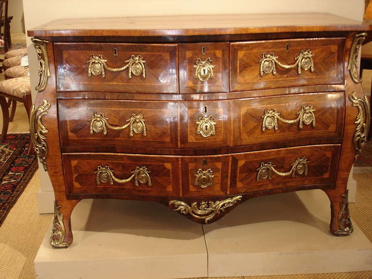 George III rosewood, sabicu and gilt bronze mounted commode