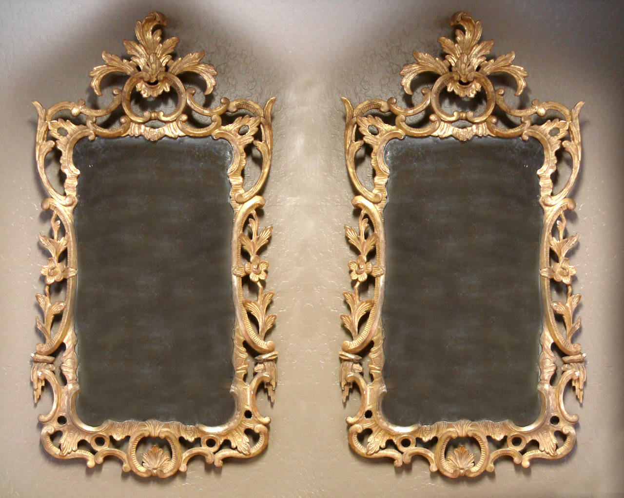 Pair of Early George III Rococo Giltwood Mirrors, in the Chippendale Manner