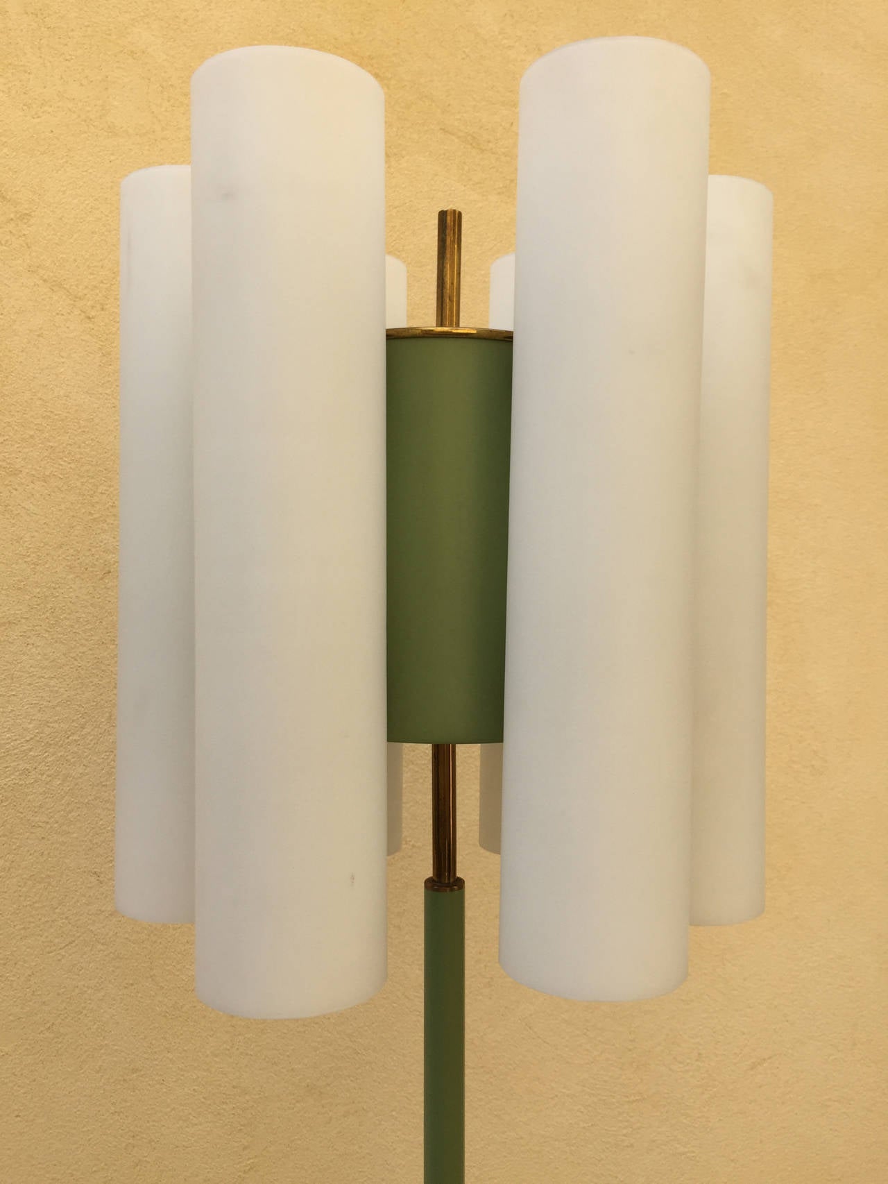 Beautiful floor lamp, design Stilnovo 1950
Painted metal frame, original colors, 6 glass tubes in white opal, 12 lamps inside, in perfect condition, all original 50 years.
marble base, the original circuit breaker.