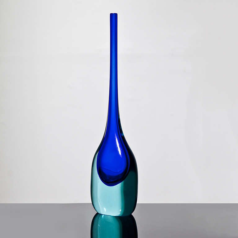 Vase with elongated neck by Flavio Poli in blue and aquamarine Sommerso glass, Italy c. 1954, for Seguso Vetri d'Arte. Provenance available

Literature: L'ARREDAMENTO 7, R. Aloi, Hoepli, Milan, 1964, p. 5 for comparable examples