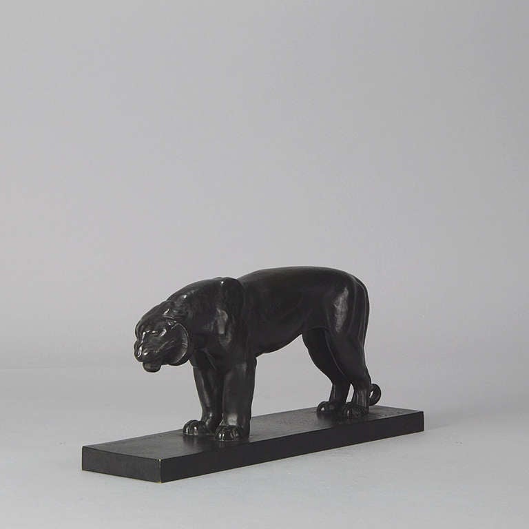 A striking stylised French Art Deco bronze study of a standing panther, the bronze exhibiting very fine hand finished smooth surface detail and rich colour, signed Joachim Costa and F Barbedienne BRONZE

Date :
    1925
Condition :
   