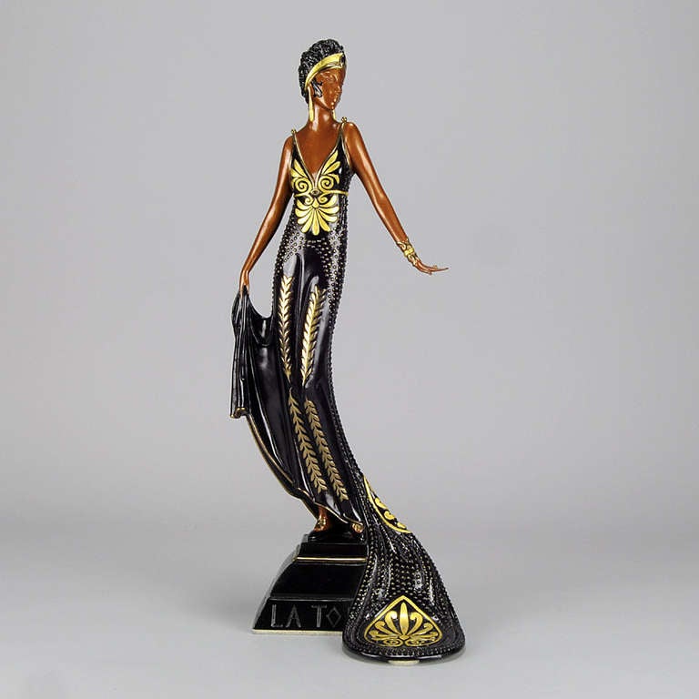 A stunning 20th Century cold painted bronze figure heightened with gilding entitled ‘La Tosca’ by Erté, Romain de Tirtoff – an elegant young lady with excellent rich purple cold painted colour heightened with gilding, raised on integral plinth.