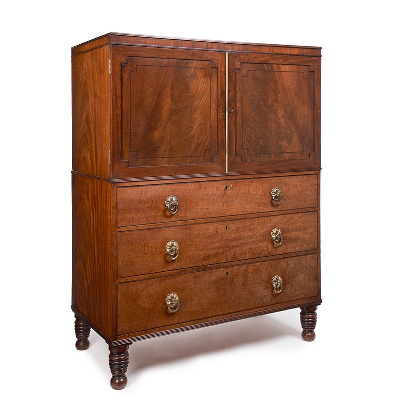 British A Regency period ebony inlaid mahogany low linen press/ cupboard For Sale