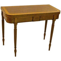 An elegant Sheraton period mahogany and satinwood tea table