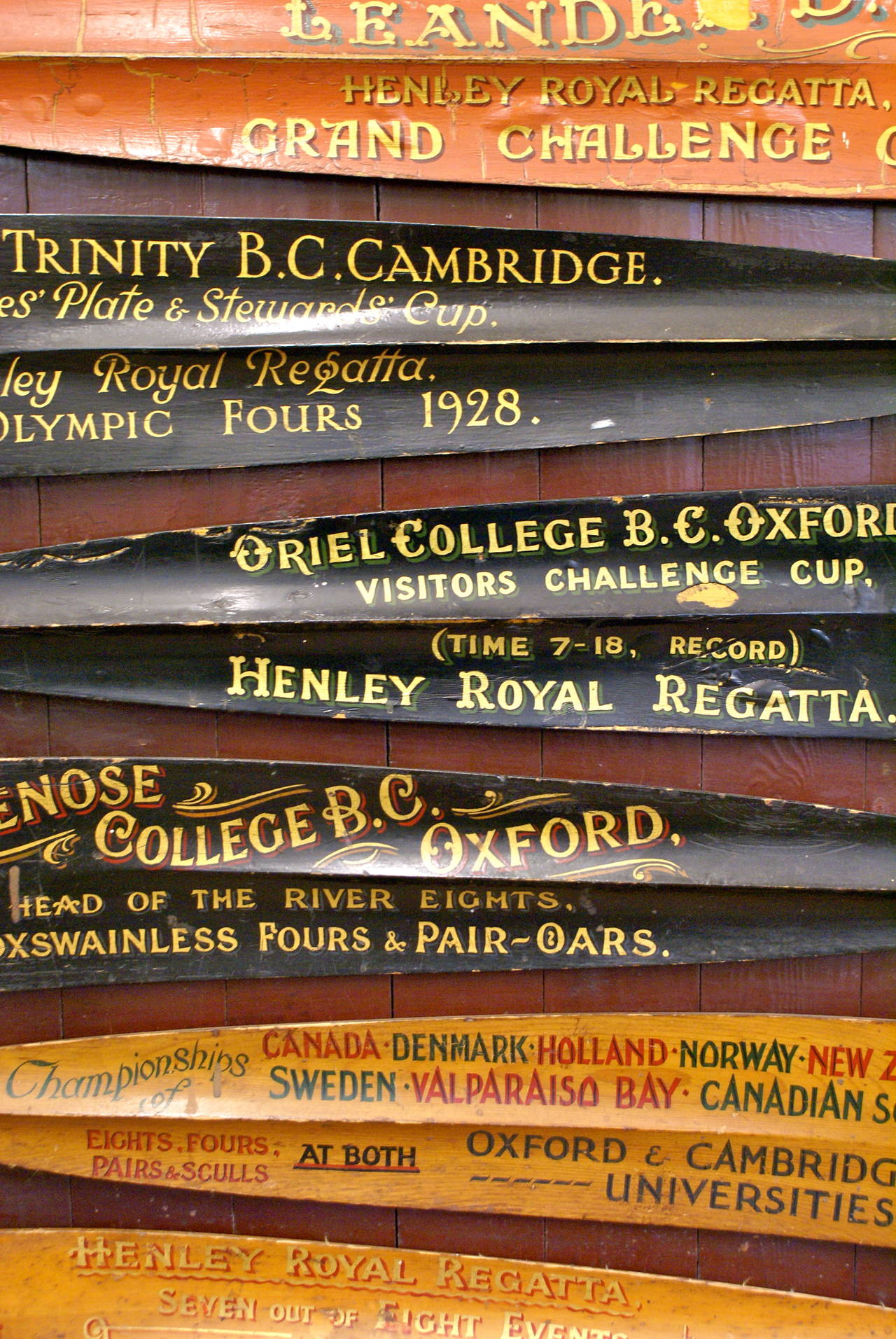 Mid-20th Century Collection of Eight Cambridge, Oxford, and Henley Regatta Oar Blades
