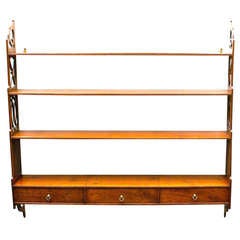 A fine set of George III, fretted hanging wall shelves