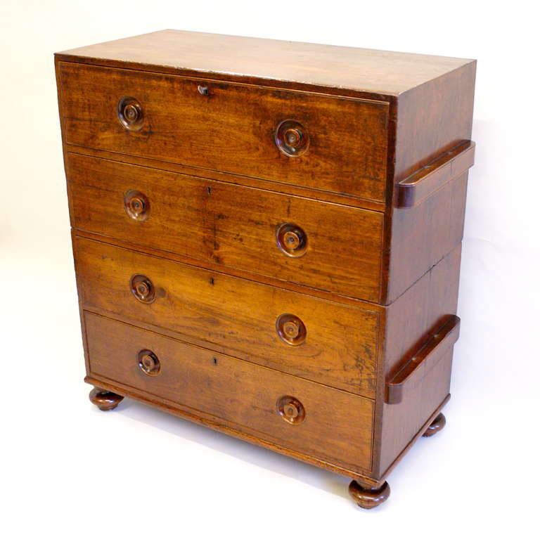 In very original condition retaining its original feet, locks, turned flush handles and side bars used for securing the chest whilst traveling, the chest also has a very good patina and mellow colour.