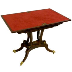 An unusual William IV rosewood games/card table.