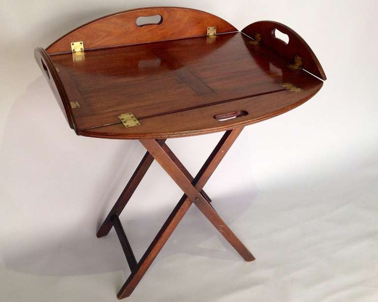 A Regency mahogany butlers tray on folding stand circa1820