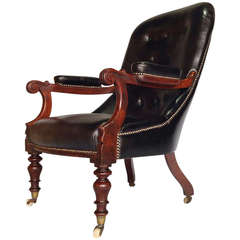 A William IV mahogany library chair or Bergere circa 1835