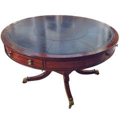 A Regency mahogany drum table with black leather top. Circa 1830