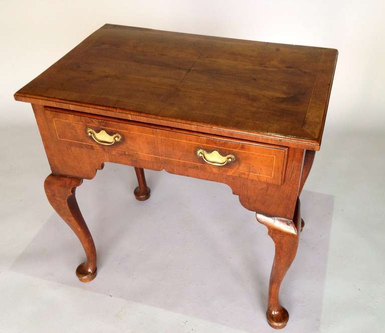 A good George I walnut lowboy or side table. Circa 1720