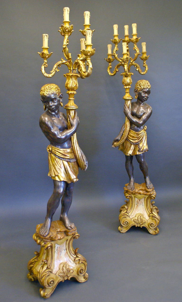 A pair of highly decorative Venetian Blackamoor Torcheres 2