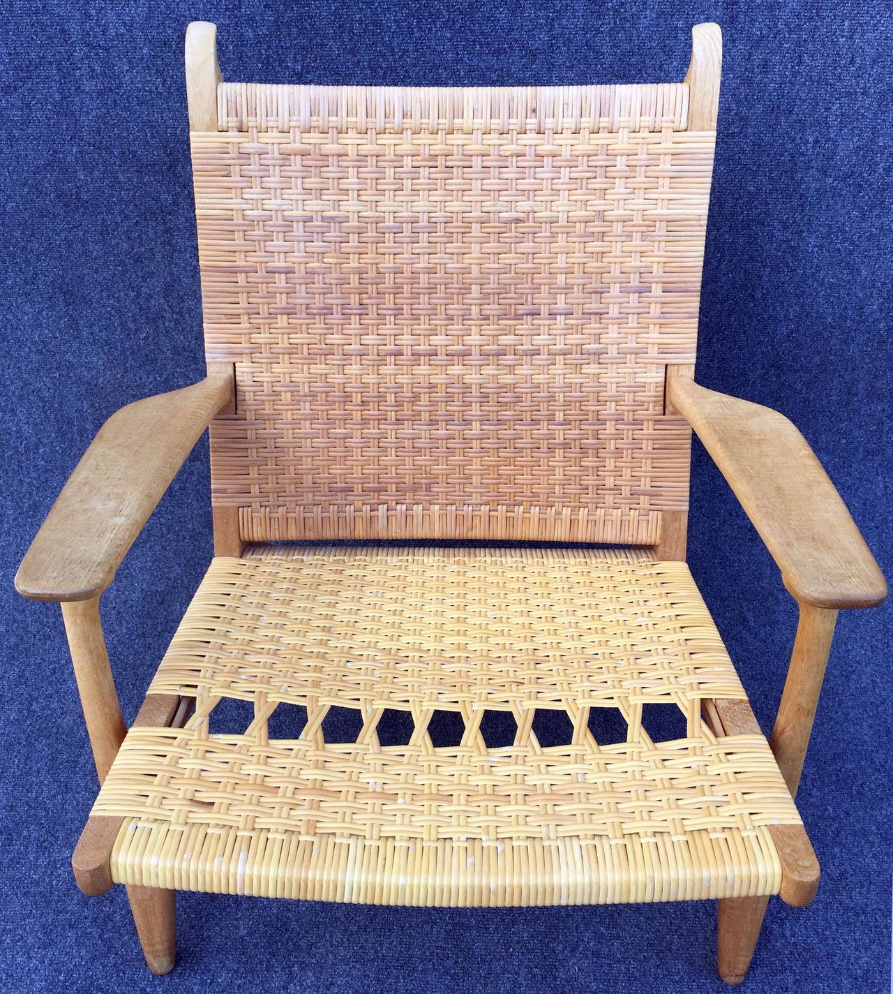This one is in very good condition, the seat has been recently re-caned, so until it has been sat in for a while there is a slight difference in the colour of the seat compared to the back.