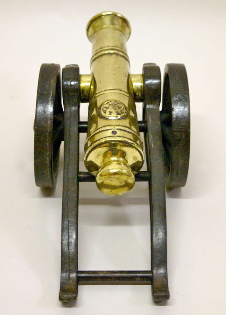 19th Century A Victorian brass ornamental cannon on cast iron carriage