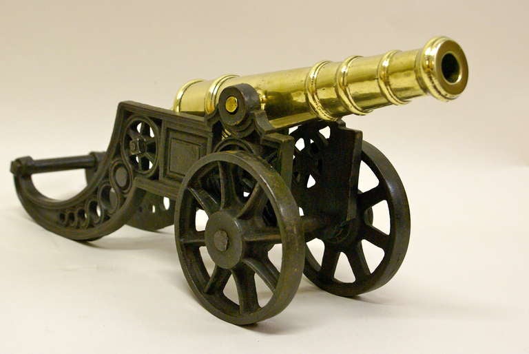 With working wheels, heavy weight carriage and tilting barrel that is both finely and realistically decorated.