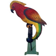Vintage A tole-ware rocking Parrot on stand