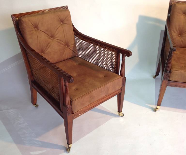English Pair of mid 19th century mahogany bergeres or library chairs Circa 1860