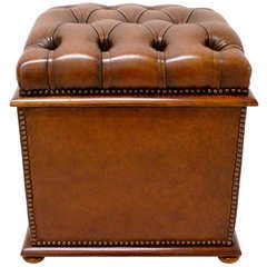 A Victorian mahogany and leather covered ottoman