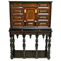 Antique A late 17th Century Flemish Tortoise shell and ebony cabinet on stand.